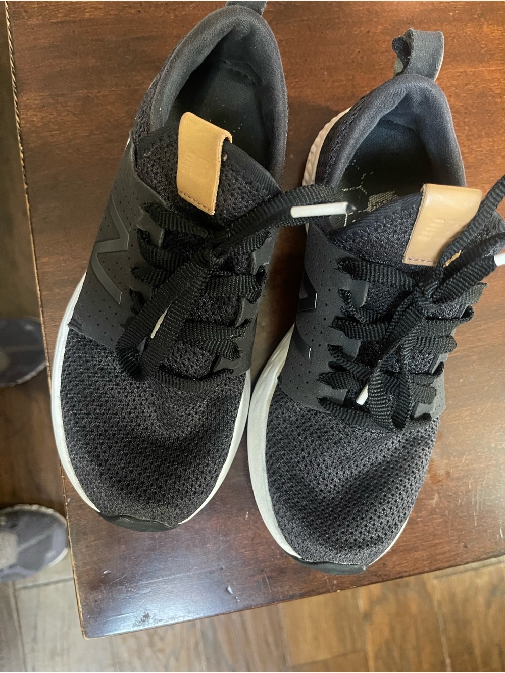 New Balance Black Athletic Shoes with Tan Pull Tabs